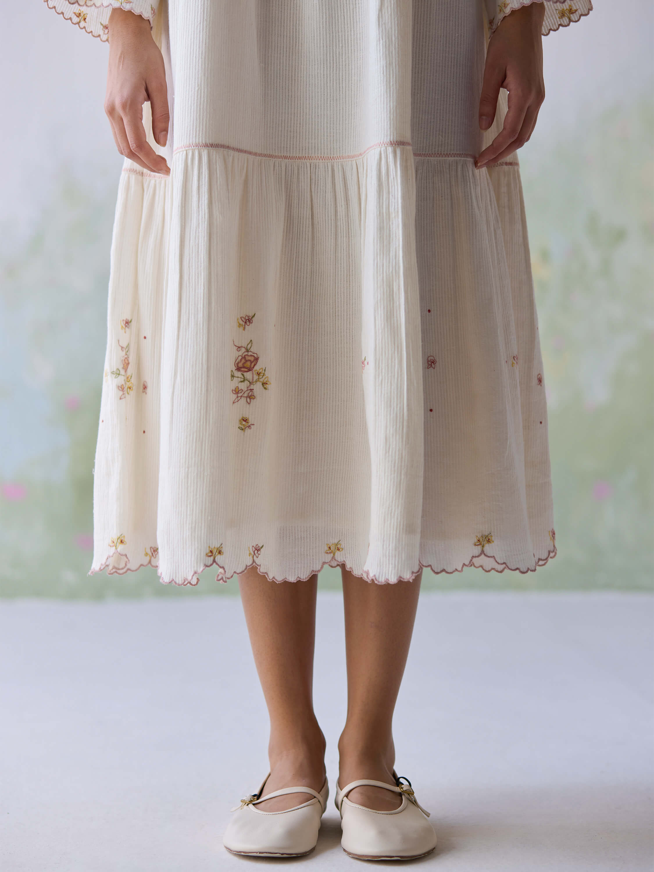Adagio Tier Midi Dress with embroidered details and elegant footwear.