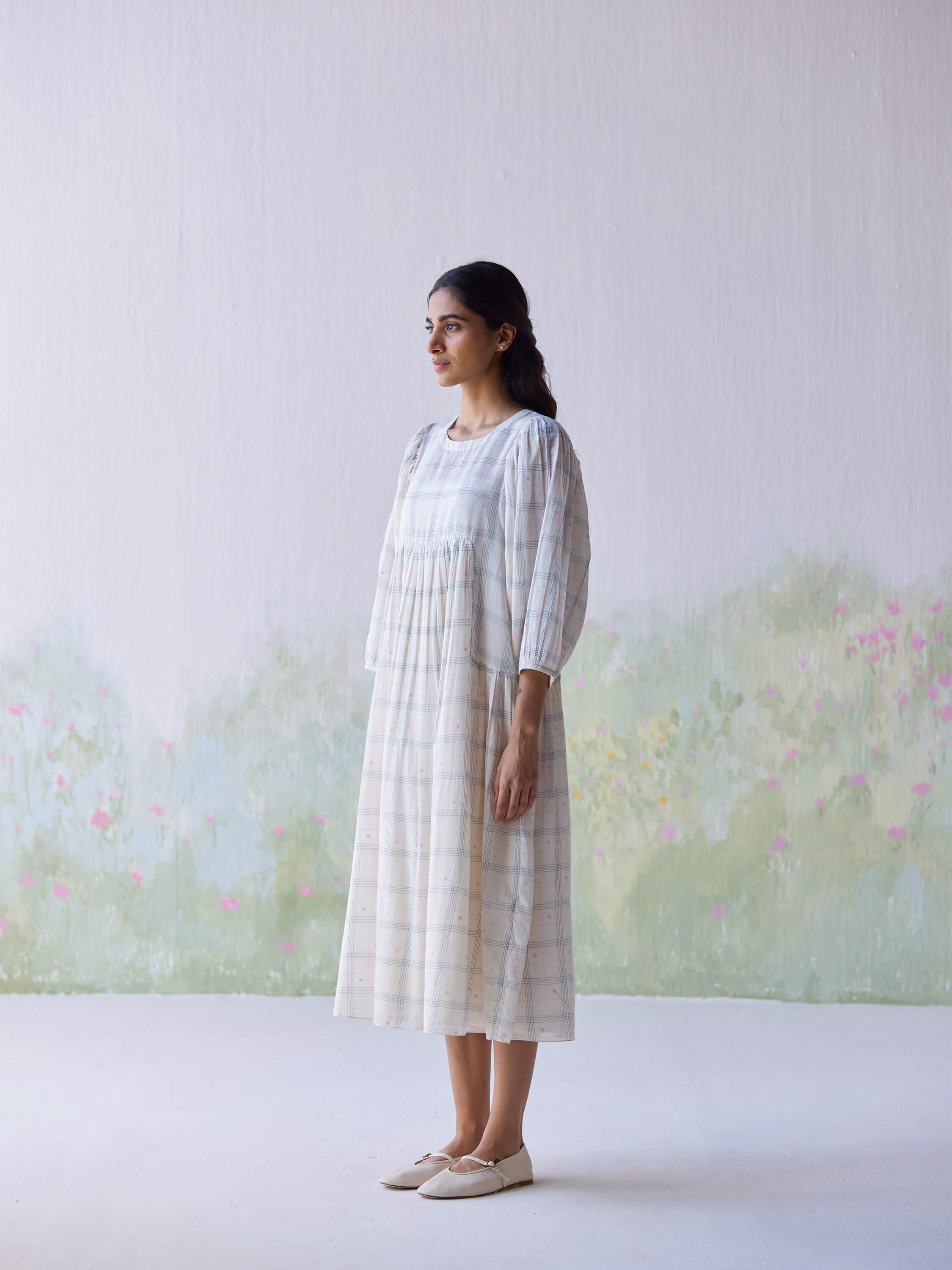 Gentle Days Jamdani Dress in soft fabric, model posing elegantly.