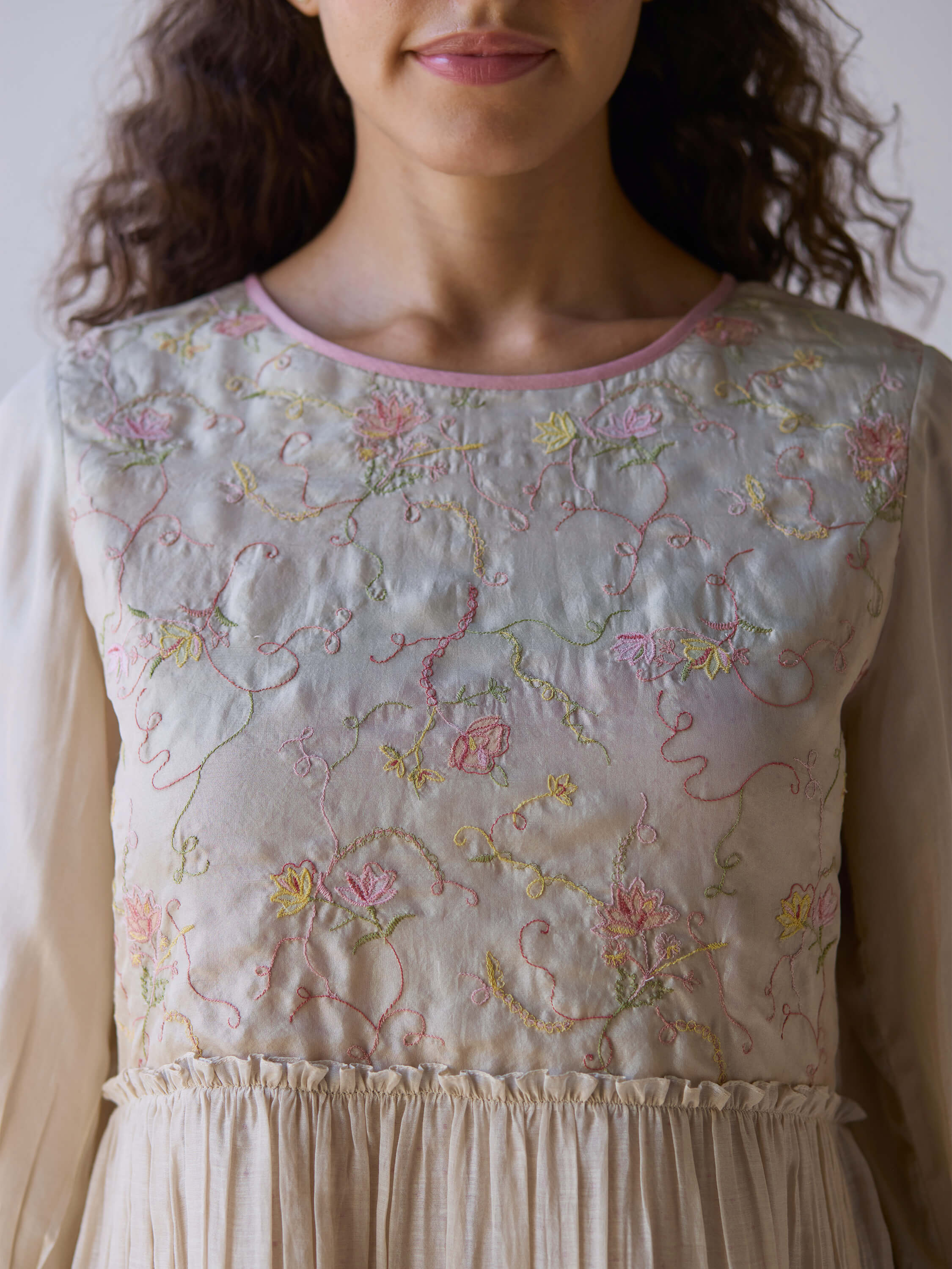 Sonata Embroidered Dress with delicate floral embroidery detail.