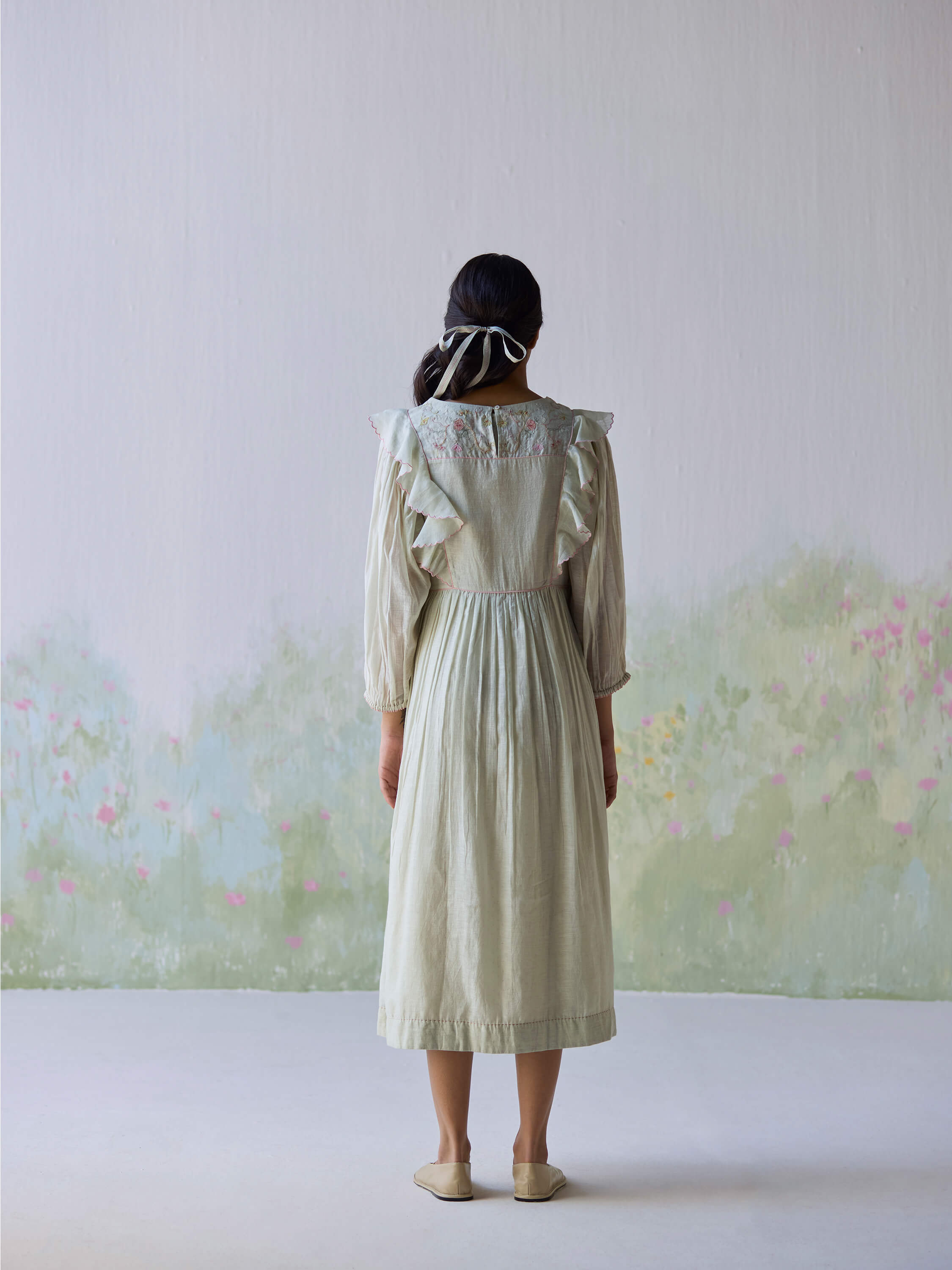 Elegant Sound of Music Midi Dress with ruffled sleeves and floral embroidery.